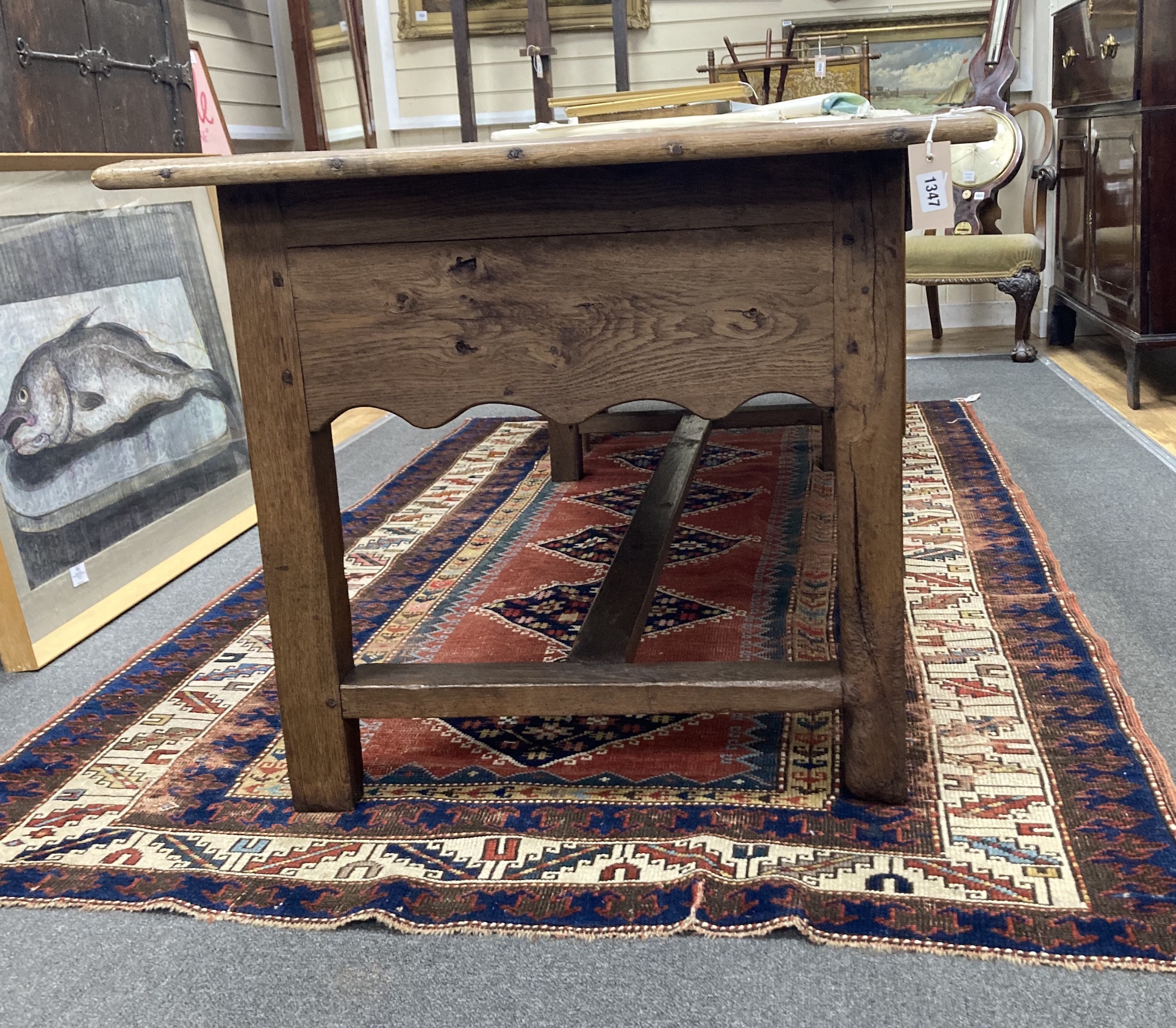 A 19th century French rectangular oak farmhouse table, length 180cm, depth 81cm, height 71cm